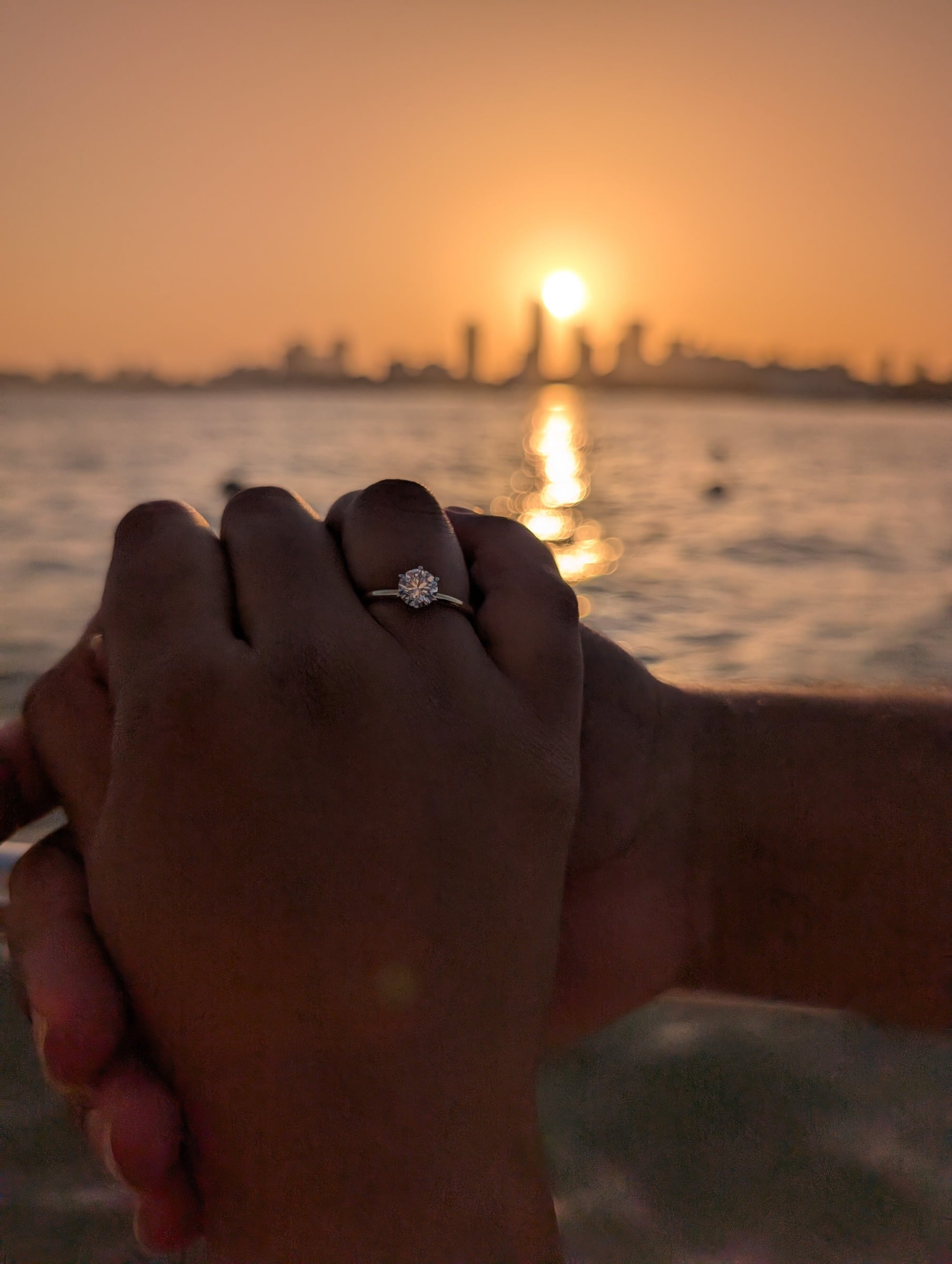 Hands at sunset